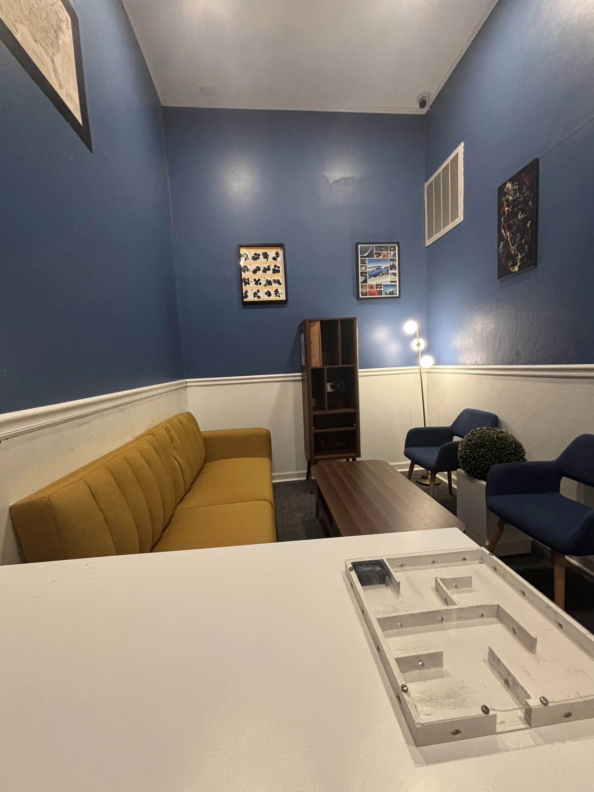 A mysterious blue office staged for a covert mission